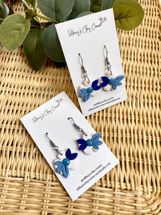 A. Creamy & Blue Floral Dangle Clay Earrings